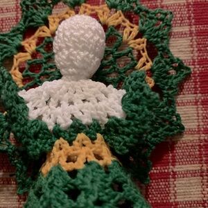 Hand crochet Angel ornament. Green and gold dress with white Angel.